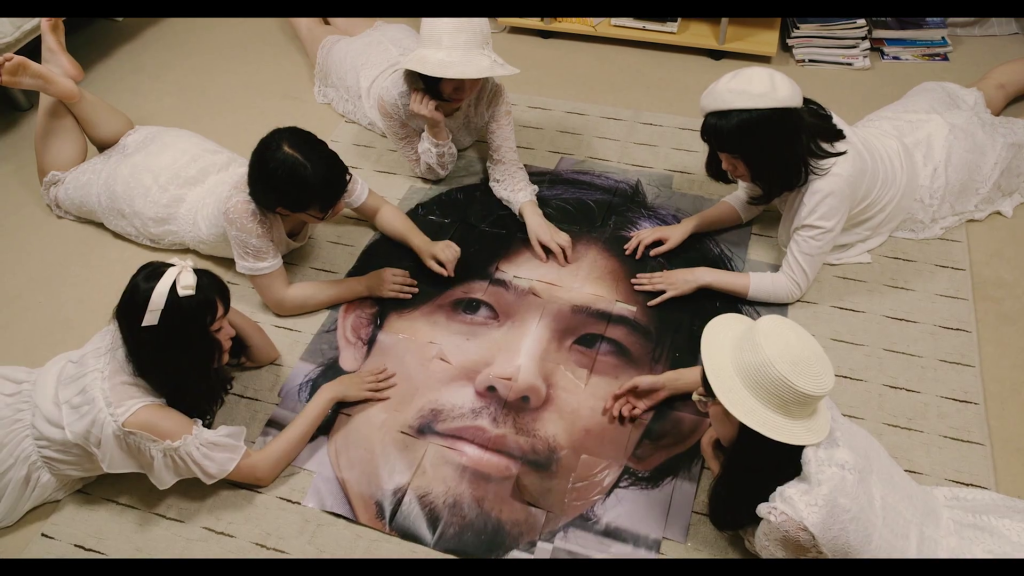 Red Post on Escher Street (2020) by Sion Sono.